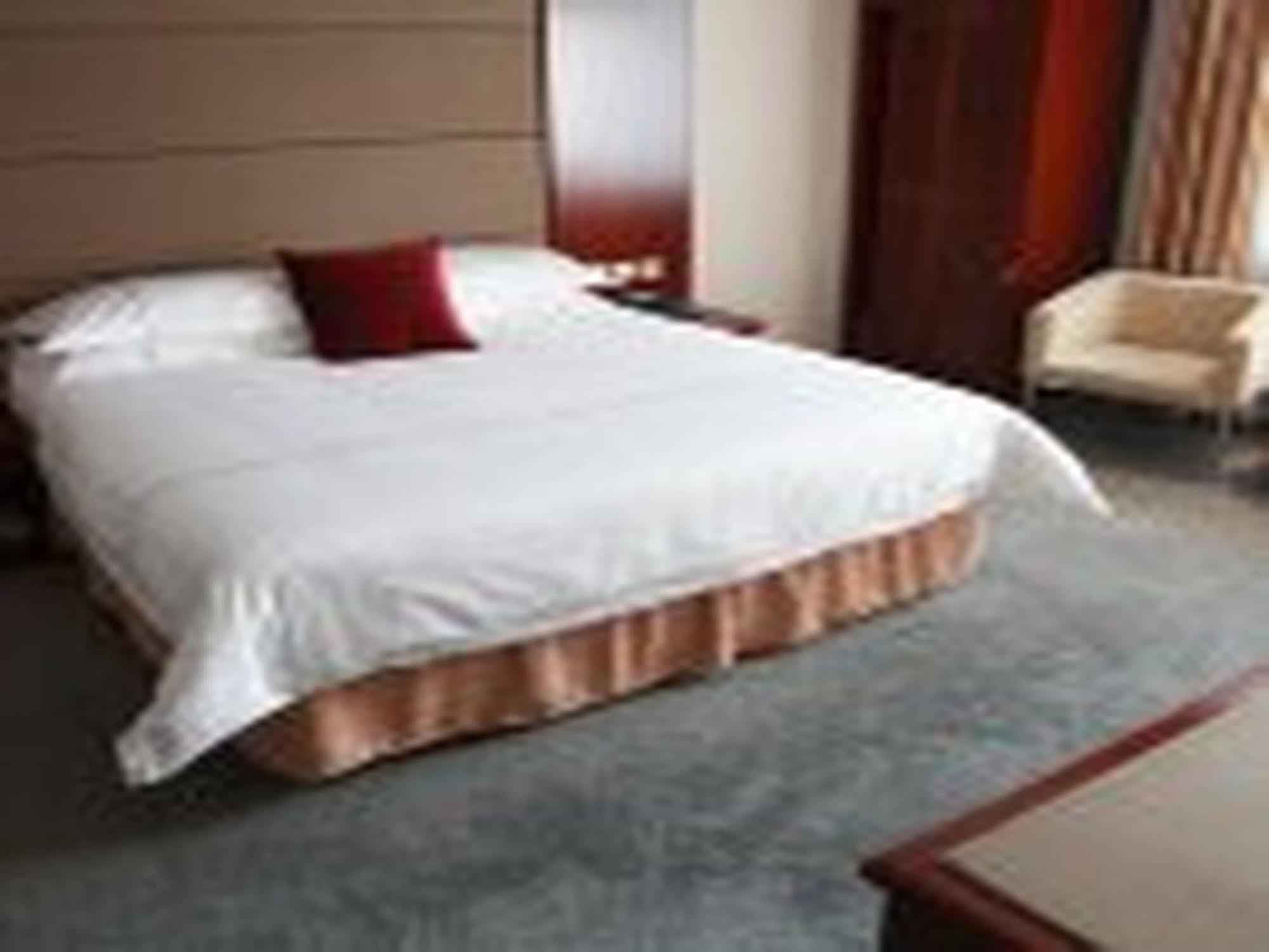 New Gloria Plaza Garden Hotel Harbin Exterior foto